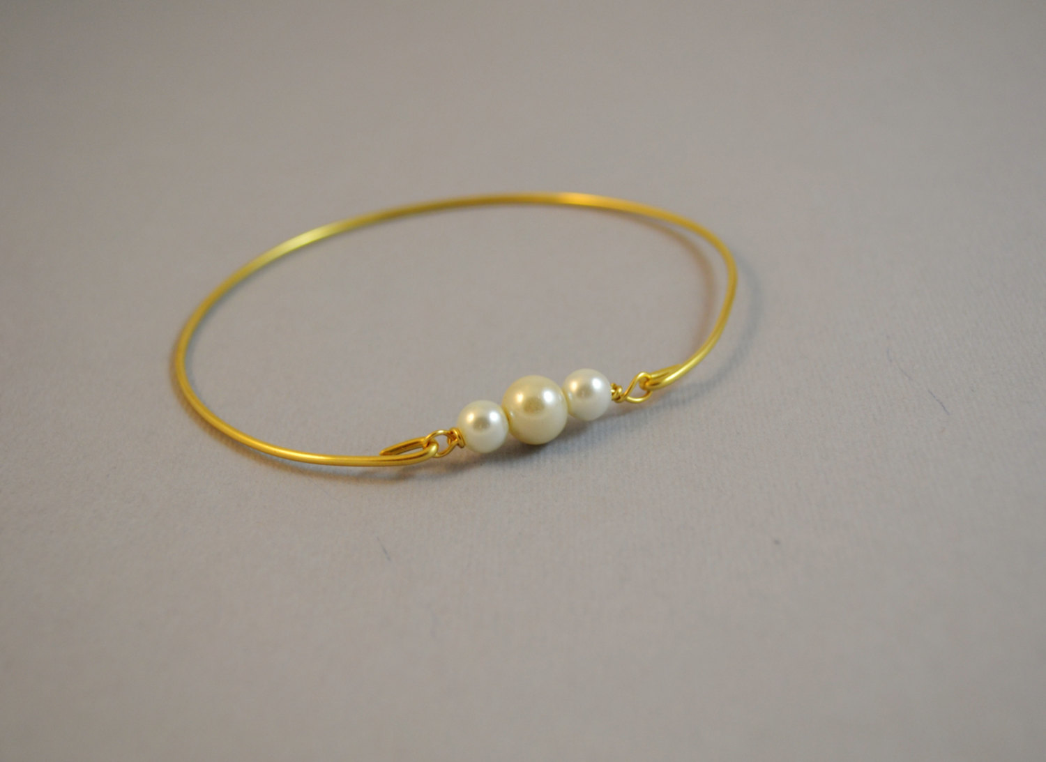 gold and pearl bangle bracelet